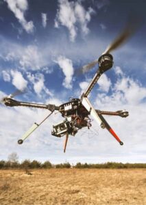 img - quadrocopter-drone-flying-in-the-sky